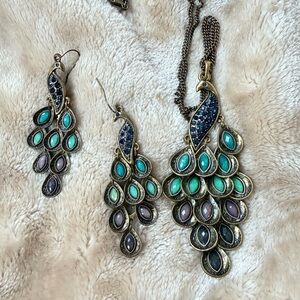 Sparkly blue gemstone peacock necklace and earring set
